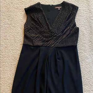 Black cocktail dress with animal print bodice
